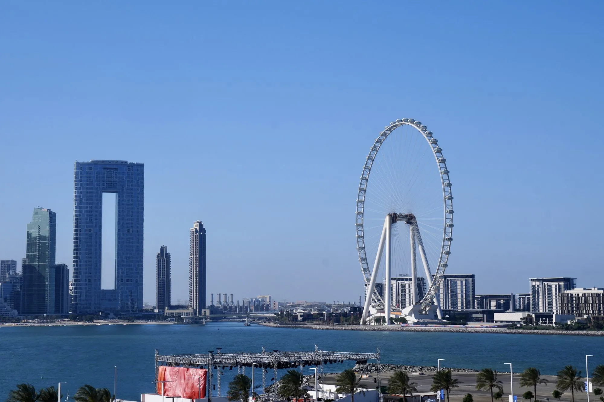 The Ain Dubai observation wheel standing on Bluewaters Island against the Dubai skyline at blue hour