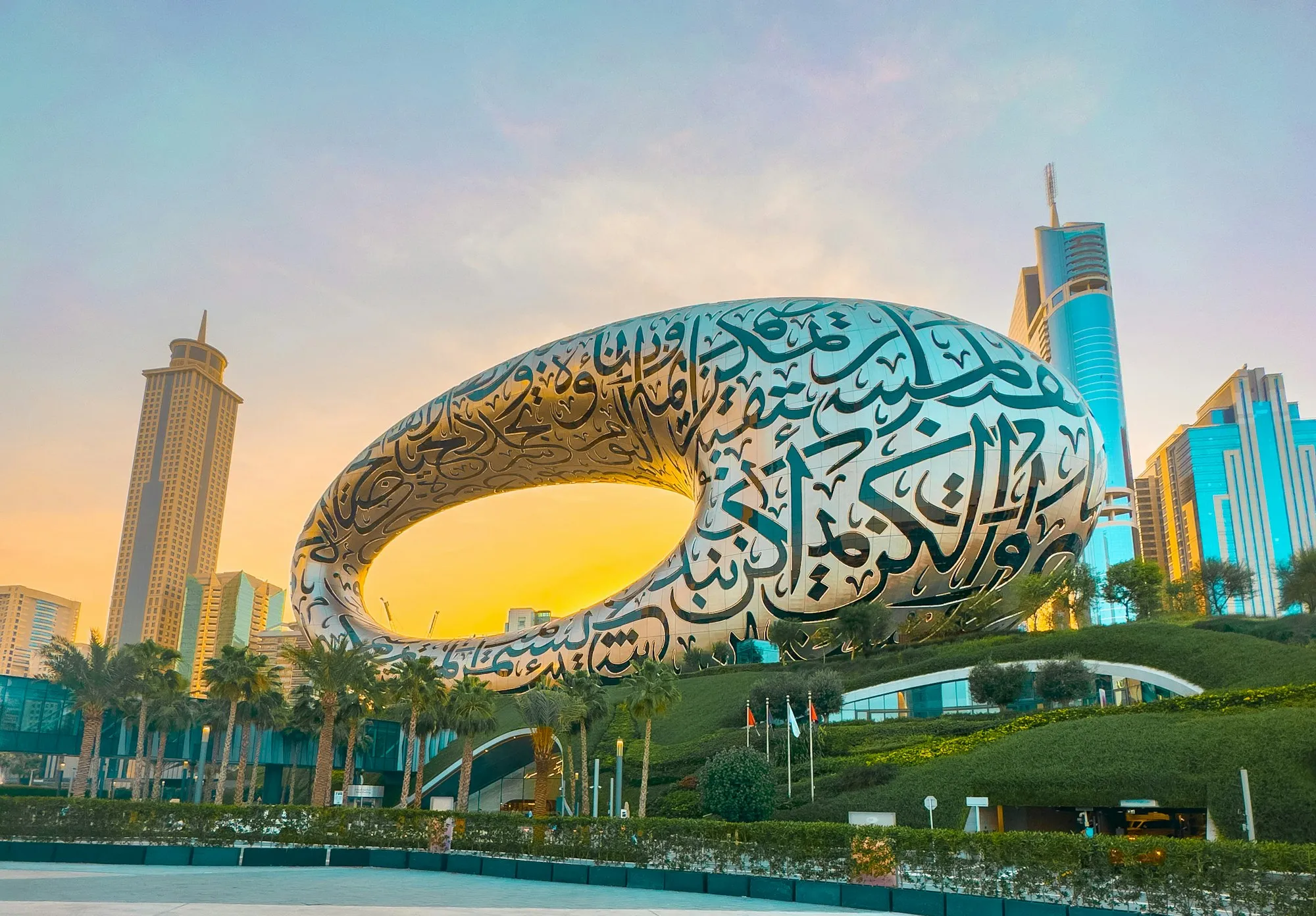 The torus-shaped Museum of the Future with its Arabic calligraphy facade at golden hour, Sheikh Zayed Road, Dubai