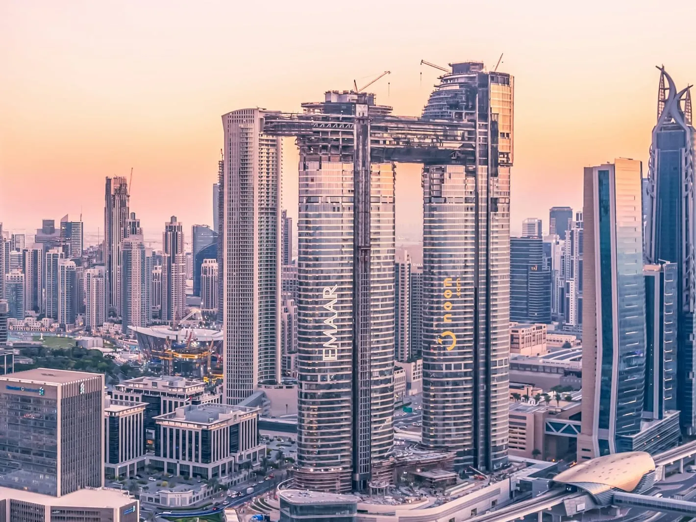 The twin Address Sky View towers in Downtown Dubai, joined near the top by the sky bridge that now houses Sky Views Dubai, photographed while it was being finished in 2019